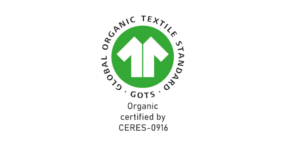 Certificeringen GOTS' logo i original grøn-hvid version. 1000x500 pixels